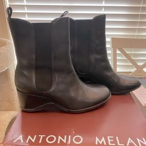 Black leather Antonio Milani boots with wedged heel. Size 7